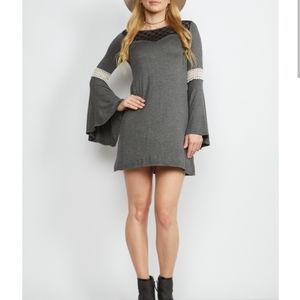 Boutique Bell Style Dress New With out Tags. Grey Dress Black lace stitching.